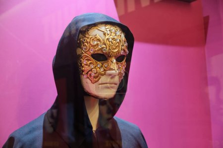 ISTANBUL, TURKEY, NOVEMBER 8, 2022: Ornate mask and cloak from movie Eyes Wide Shut directed by Stanley Kubrick on display at S. Kubrick exhibition at Istanbul Cinema Museum.