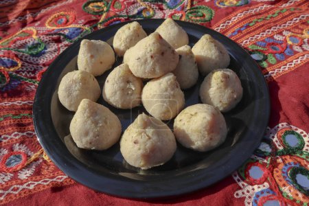 Photo for Indian sweet dish item. Malai peda modak shape special dessert sweets for festivals like Diwali - Royalty Free Image