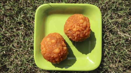 Indian sweet boondi laddu or Motichoor laddoo made of gram flour, Sweet balls popular Indian traditional sweets.
