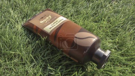 Photo for Plum coffee fragrance hand cream tube. Branded aromatic handcream to keep hands soft, it is vegan. Handcream tube bought on 12, january, 2024 from India - Royalty Free Image