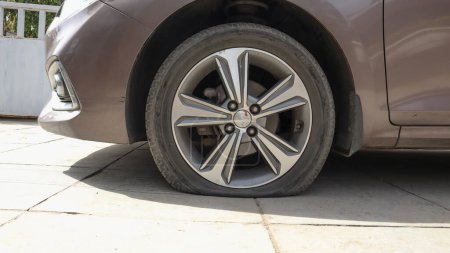 Photo for Flat tyre car, Flat car tire wheel punctured - Royalty Free Image