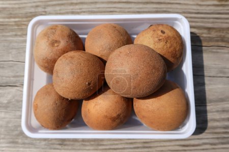 Sapota fruit or Chikoo fruit, sweet in taste. Sapodilla is tropical fruit with seed inside