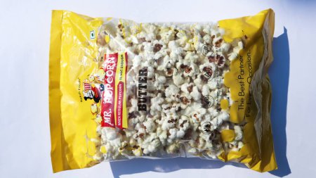 Photo for Mr.Popcorn brand, crunchy and fluffy Butter flavoured Popcorns in plastic bag - Royalty Free Image