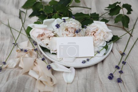 Photo for Festive floral composition with English roses, lavender, ribbon. Blank business card, wedding invitation mockup. Beige linen tablecloth background, rustic style,top view, flat lay. Birthday, Mothers - Royalty Free Image