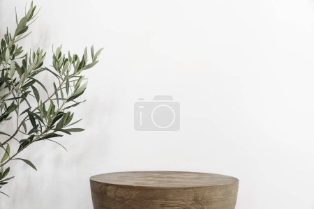 Photo for Empty wooden textured podium. Tabletop, olive tree branch. Fresh green leaves, white space background. Organic cosmetic natural product pedestal. Table, platform for promotion show display, summer - Royalty Free Image