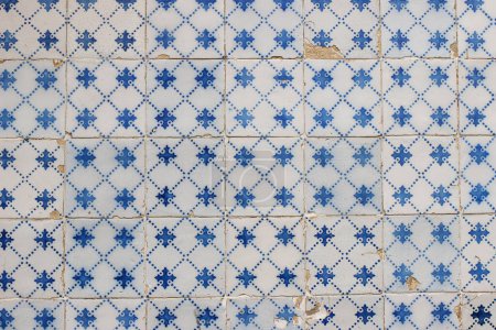 Photo for Simple blue traditional Portuguese ceramic tile pattern, azulejos, dots. Beautiful shabby dirty facade, wall decoration. Old Lisbon building, Portugal, decorative background with geometric ornaments. - Royalty Free Image