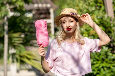 Photo for Cute girl lovely pretty young blonde girl in hat in the summer at the park adorable - Royalty Free Image
