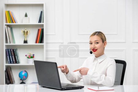 Photo for Customer service cute blonde girl office shirt with headset and computer smiling cutely - Royalty Free Image