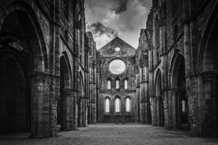 Photo for Abbey of San Galgano with collapsed roof after a lightning strike on the bell tower. October 2022. Black and white picture - Royalty Free Image