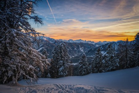 Torri Vajolet at sunset in Rosengarten Catinaccio massif. Beautiful view in Dolomites mountains, Alto Adige, South Tyrol, Italy. January 2024