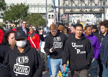 Photo for San Francisco, CA - Jan 16, 2023: Unidentified participants in Martin Luther King March from Caltrain station down 4th St over the bridge then up 3rd St over the bridge to Yerba Buena Garden - Royalty Free Image