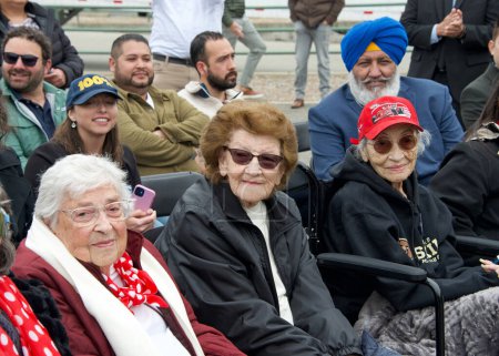 Photo for Richmond, CA - May 25, 2023: Jeanne Gibson, Marian Sousa, Betty Reid Soskin. a few of the original "Rosie the Riveters" waiting to meet Governor Newsom outside their former factory. - Royalty Free Image