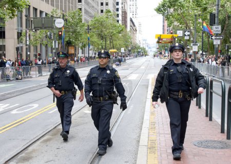 Photo for San Francisco, CA - June 24, 2023: SFPD officers patrol the route prior to the SF Gay Pride Parade up Market  St to Civic Center. Theme, Looking Back, Moving Forward. - Royalty Free Image