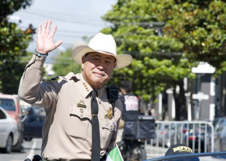 Photo for San Francisco, CA - Oct 8, 2023: Sheriff Paul Miyamoto participating in the 155th annual Italian Heritage Parade,  celebrating the accomplishments and culture of all Italian Americans. - Royalty Free Image
