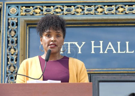 Photo for San Francisco, CA - Oct 16, 2023: Director Kimberly Ellis speaking at a Press conference during a Domestic Violence Awareness Month Rally outside City Hall - Royalty Free Image