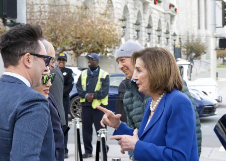 Photo for San Francisco, CA - Dec 15, 2023: Nancy Pelosi speaking with participants at the street dedication ceremony for Michael Tilson Thomas, music director laureate. - Royalty Free Image