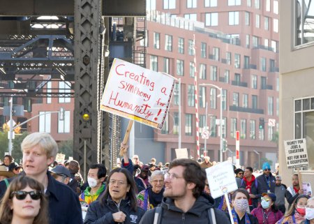 Photo for San Francisco, CA - Jan 15, 2024: Participants in Martin Luther King March walking from Caltrain station down 4th St over the bridge then up 3rd St over the bridge to Yerba Buena Garden - Royalty Free Image
