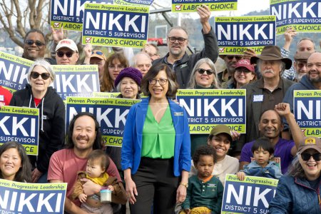 Photo for Oakland, CA - Jan 27, 2024: Nikki Fortunato Bas posing for a photo with supporters out to canvass with her for her campaign for Alameda County District 5 Supervisor - Royalty Free Image