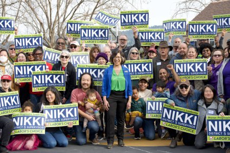 Photo for Oakland, CA - Jan 27, 2024: Nikki Fortunato Bas posing for a photo with supporters out to canvass with her for her campaign for Alameda County District 5 Supervisor - Royalty Free Image