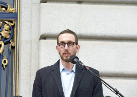 Photo for San Francisco, CA - March 01, 2024:  State Senator Scott Wiener speaking at an Affordable Housing Press Conference in front of City Hall - Royalty Free Image