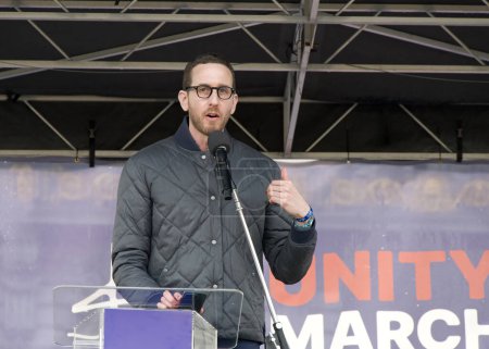 Photo for San Francisco, CA - March 03, 2024: Senator Scott Wiener speaking at a Rally Against Anti-Semitism at Civic Center. - Royalty Free Image