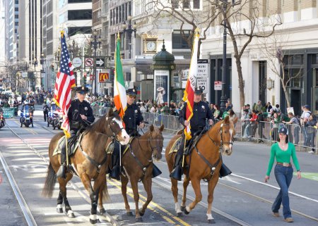 Photo for San Francisco, CA - March 16, 2024: Unidentified participants in the 173rd annual St Patricks Day parade. The West Coasts largest Irish even celebrating Irish culture - Royalty Free Image