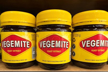 Photo for Oakland, CA - July 1, 2022: Grocery store shelf with jars of Vegemite brand Yeast Extract, a thick black Australian food spread made from leftover brewers yeast extract with vegetables and spice - Royalty Free Image