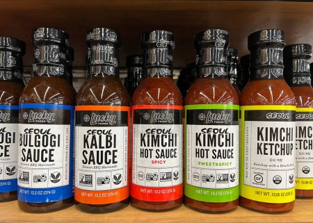 Photo for Oakland, CA - July 1, 2022: Grocery store shelf with bottles of Lucky Foods brand Korean BBQ marinades and sauces. - Royalty Free Image
