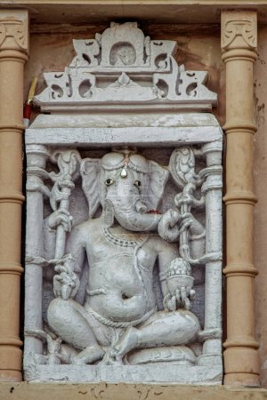 Foto de 01 28 2010ancient stone sculptures carved into the wall of the Jain  temple indian deities Ganesha Taranga Hill Mehsana , Gujarat , India , Asia - Imagen libre de derechos
