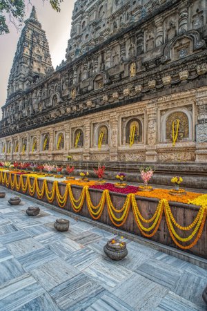 Photo for 12 25 2014 Garlands with flowers and festive bouquets at Mahabodhi Temple,Bodh Gaya Bihar India Asia. - Royalty Free Image