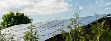 Photo for New ecologic house with solar panels Alternative to conventional energy. The battery is charged from a solar cell Advertisement Green energy Sustainable life Renewable alternative energy - Royalty Free Image