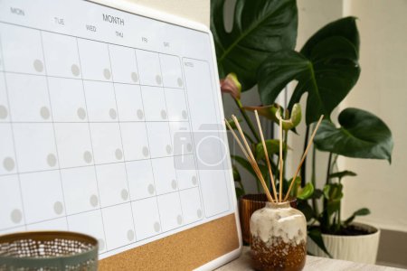 Photo for Monthly PLANNER. Empty Magnetic board with the days of the month. Place to enter important matters schedule. Concept for business planning. Whiteboard Planner magnetic monthly template. Interior of - Royalty Free Image