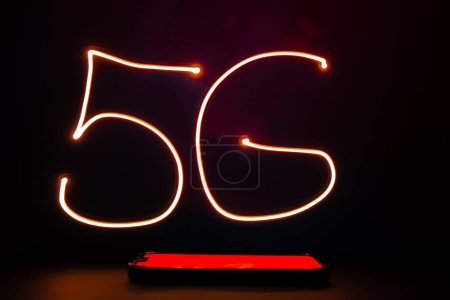 Photo for Abstract red lines long exposure light shape of 5G. Network internet mobile wireless business concept Innovations in the future 5G cellular and Internet speeds. - Royalty Free Image