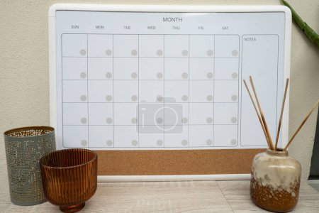 Photo for Monthly PLANNER. Empty Magnetic board with the days of the month. Place to enter important matters schedule. Concept for business planning. Whiteboard Planner magnetic monthly template. Interior of freelancer workplace - Royalty Free Image