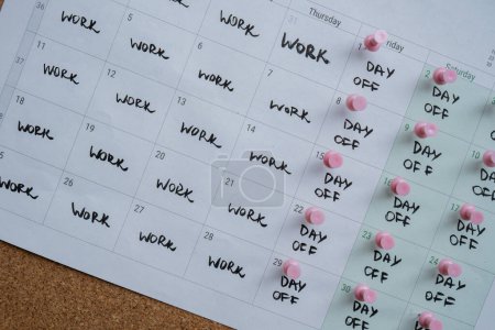 4 day work week printed calendar with pink pins on three days off in week weekend days four day working week concept. Modern approach doing business short workweek. Effectiveness of employees