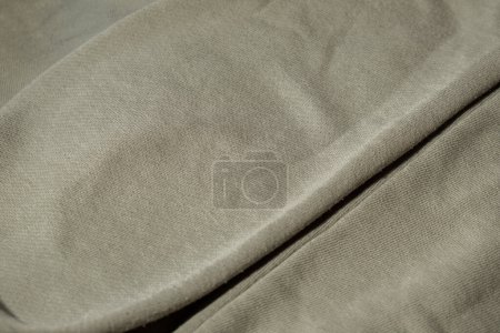 Photo for No Lints on green sweater. After cleaning and collected fluff lint. Closeup Pilled Clothes. Old used Clothes without lint pilling. Restoration of old damaged care. Repairing fabric textile reducing - Royalty Free Image