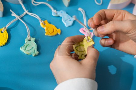 Children air dry clay activity handicraft idea. DIY process step by step instruction. Preparing for Easter holiday decorating. Modern organic design minimalistic plastic free sustainable decor
