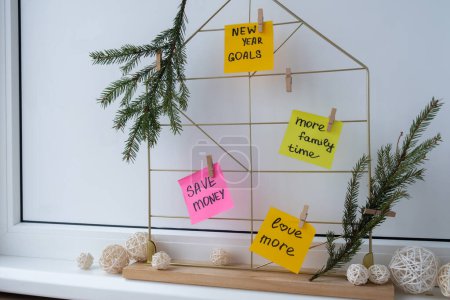 Photo for Action board new years resolutions on colorful sticky notes. Making promises for new year, setting goals. Dream year motivation - Royalty Free Image