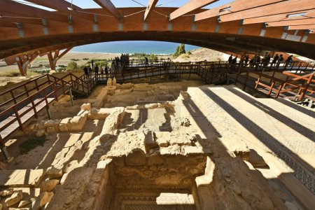 Photo for Episkopi,Cyprus - September 30, 2023: Group of tourists visits the ancient mosaics and excavations located under a special roof structure in Kourion archaeological park, situated on Akrotiri peninsula - a part of the British Overseas Territory of Akr - Royalty Free Image