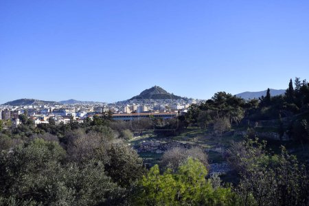 Athens, Greece - cityscape with view to Lycavittos Hill also known as Mount Lycabettus 