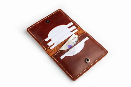 Téléchargez les photos : Brown leather wallet with blank cards, isolated on white background - en image libre de droit