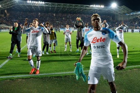 Photo for Napoli Players  celebrates at the end of match Victor Osimhen of Napoli   during  italian soccer Serie A match Atalanta BC vs SSC Napoli at the Gewiss Stadium in Bergamo, Italy, November 05, 2022 - Credit: AGN Fot - Royalty Free Image