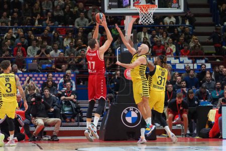 Photo for Johannes Voigtmann (EA7 Emporio Armani Olimpia Milano) thwarted by Nick Calathes (Fenerbahce Beko Istanbul)  during Basketball Euroleague Championship EA7 Emporio Armani Milano vs Fenerbahce Beko at the Forum of Assago in Milan, Italy, November 24, 2 - Royalty Free Image