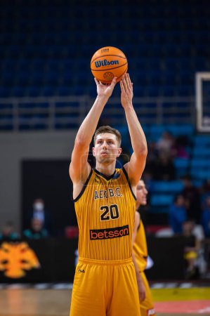 Photo for #20 MADSEN ALEXANDER of AEK Athens BC during the Basketball Champions League, Gameday 5, match between AEK Athens BC and UNAHOTELS Reggio Emilia at Ano Liossia Olympic Hall on December 7, 2022 in Athens, Greece. - Credit: Stefanos Kyriazis/LiveMedi - Royalty Free Image