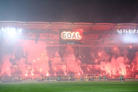 Photo for Aek FC supporters celebrating the goal during the Greek Super League, Matchday 17, match between Aek FC and Panathinaikos FC at Opap Arena Stadium on January 8, 2023 in Athens, Greece. - Credit: Stefanos Kyriazis/LiveMedi - Royalty Free Image
