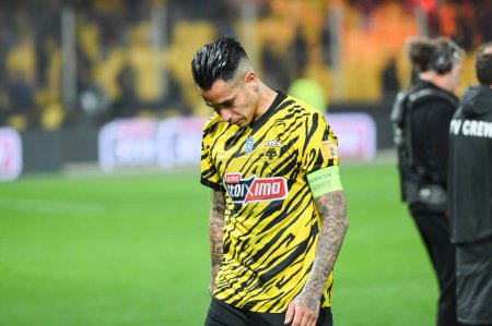 Photo for 11 SERGIO ARAUJO of AEK FC with head down after the defeat from Olympiacos FC during the Greek Super League, Matchday 26, match between AEK FC and Olympiacos FC at OPAP Arena on March 12, 2023, in Athens, Greece. - Credit: Stefanos Kyriazis/LiveMedi - Royalty Free Image