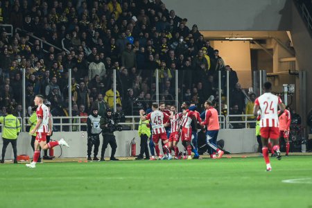Photo for Players of Olympiacos FC celebrating a goal during the Greek Super League, Matchday 26, match between AEK FC and Olympiacos FC at OPAP Arena on March 12, 2023, in Athens, Greece. - Credit: Stefanos Kyriazis/LiveMedi - Royalty Free Image
