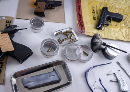 Several firearms of different calibre in a crime lab investigation, conceptual image