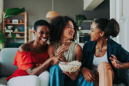 Photo for Happy beautiful hispanic south american and black women meeting indoors and having fun - Black adult females best friends spending time together, concepts about domestic life, leisure, friendship and togetherness - Royalty Free Image