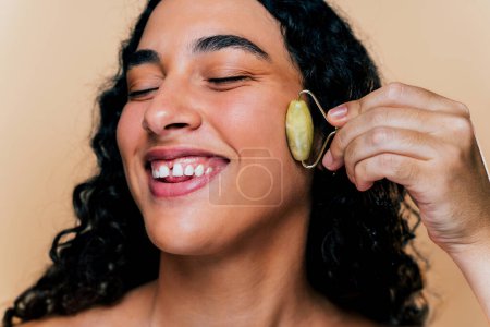 Photo for Beauty studio portrait of beautiful young woman with diastema - Confident and interesting female with diverse and unique style, concepts about skin care, body care, individuality and body acceptance - Royalty Free Image